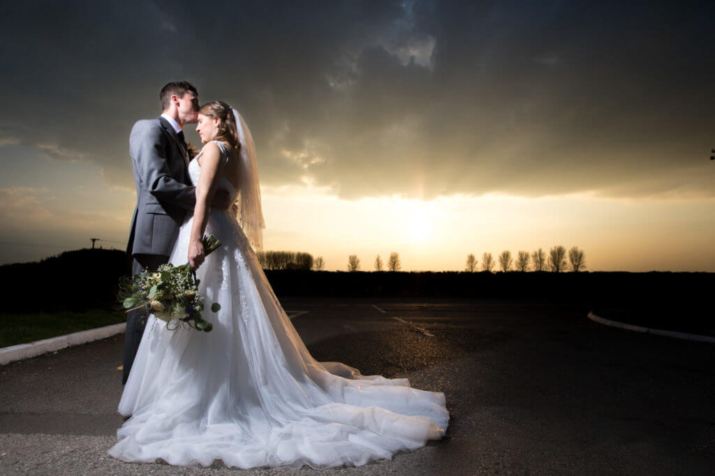 bride grooms romantic sunset moment holiday inn milton keynes oxfordshire wedding photographer