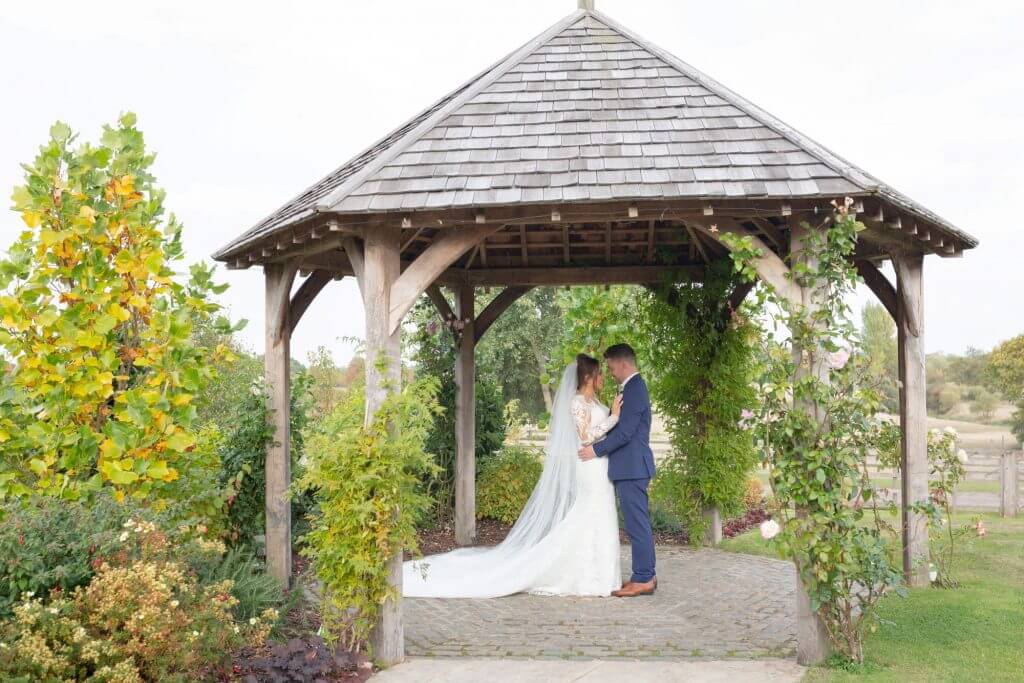 15 bride groom under dovecote mythe barn luxury venue leicestershire oxfordshire wedding photographer