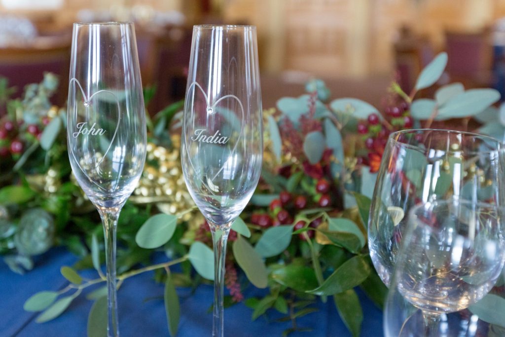 bride and groom wine glasses south lodge hotel horsham west sussex oxford wedding photographers