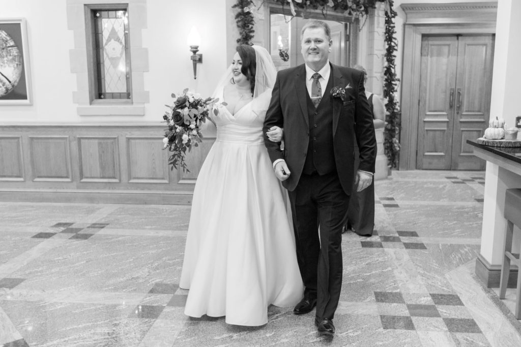 bride and father walk to ceremony south lodge hotel west sussex oxfordshire wedding photography