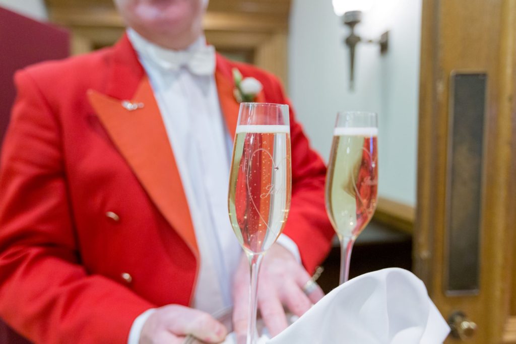 master of ceremonies serves champagne south lodge hotel west sussex oxford wedding photographer
