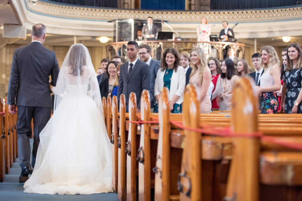 walking down the aisle westminster chapel london oxford wedding photographer
