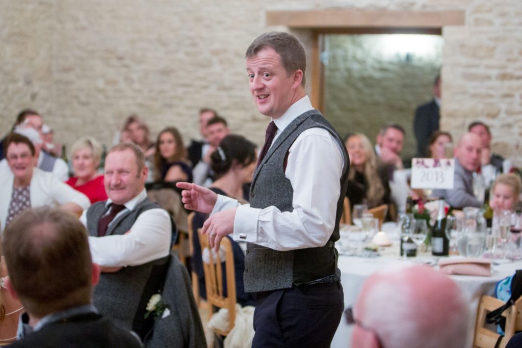 Humorous grooms speech kingscote barn venue tetbury oxfordshire wedding photographers