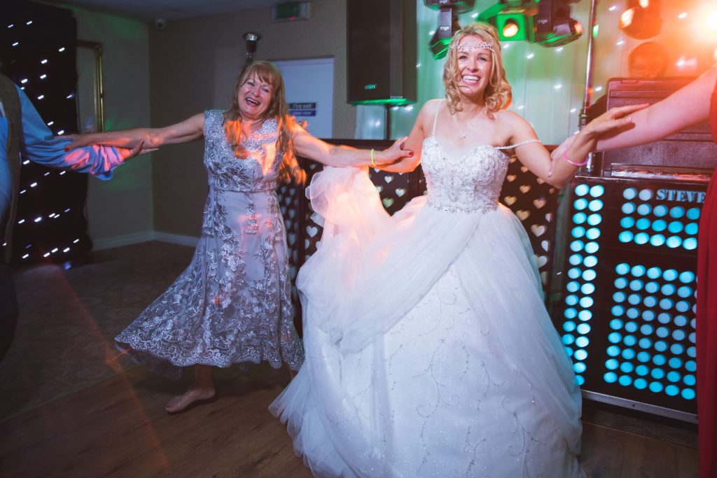 bride guests hold hands wroxeter hotel dancefloor shrewsbury shropshire oxford wedding photography