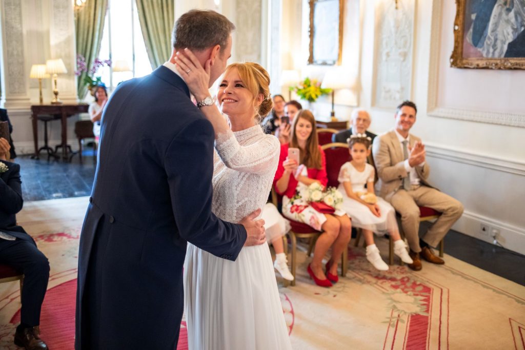 19 bride groom embrace marriage ceremony lansdowne club mayfair london oxford wedding photographer