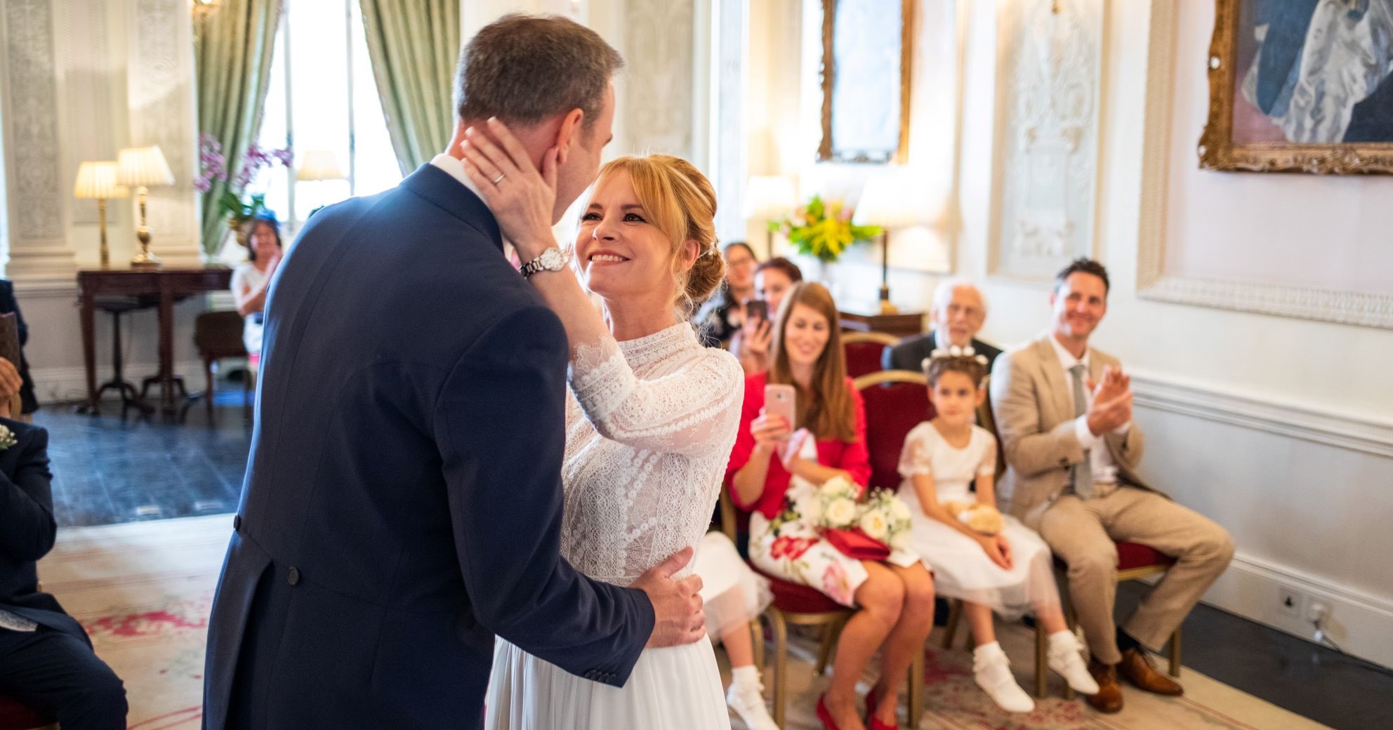 19 bride groom embrace marriage ceremony lansdowne club mayfair london oxford wedding photographers