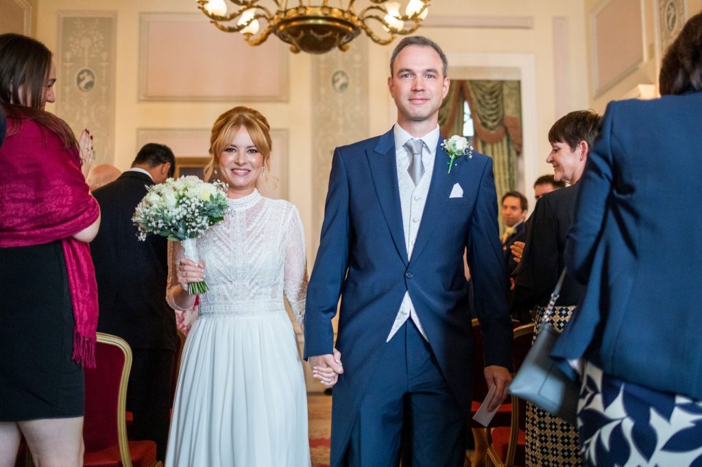 21 groom bride walk down aisle lansdowne club mayfair london oxford wedding photography