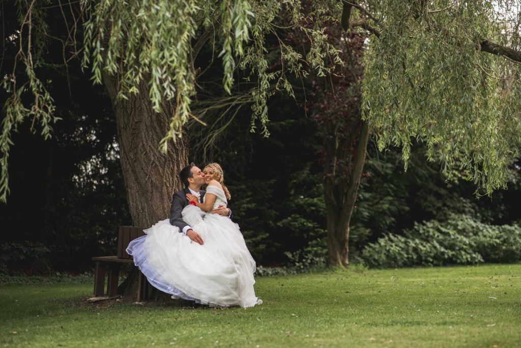 bride groom cuddle alone wroxeter hotel shrewsbury gardens shropshire oxfordshire wedding photography