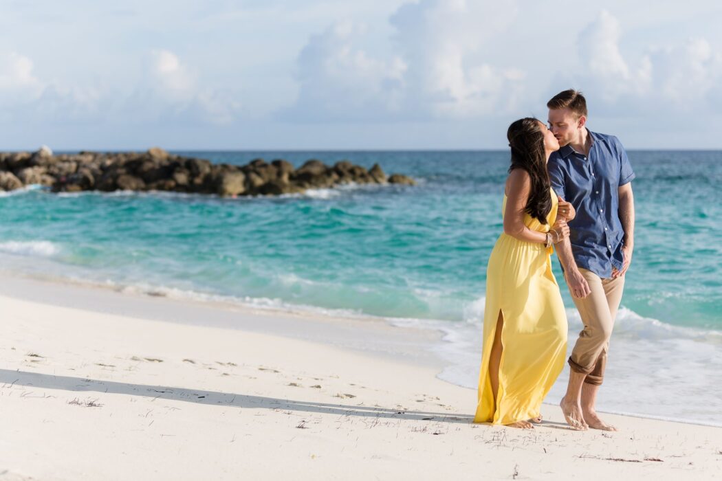 bride groom stroll nassau beach atlantis hotel paradise island s r urwin destination wedding photography