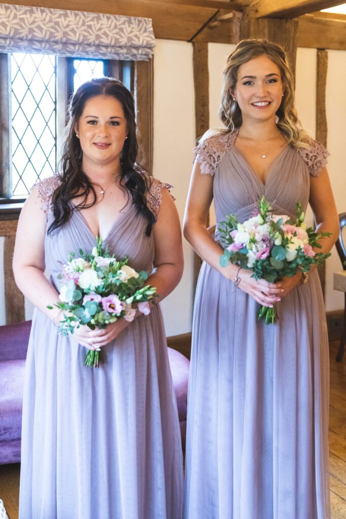 bridesmaids with bouquets bridal prep cain manor surrey oxfordshire wedding photographer