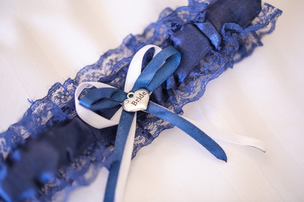 12 brides blue garter bridal prep hanbury manor ware hertfordshire oxfordshire wedding photography