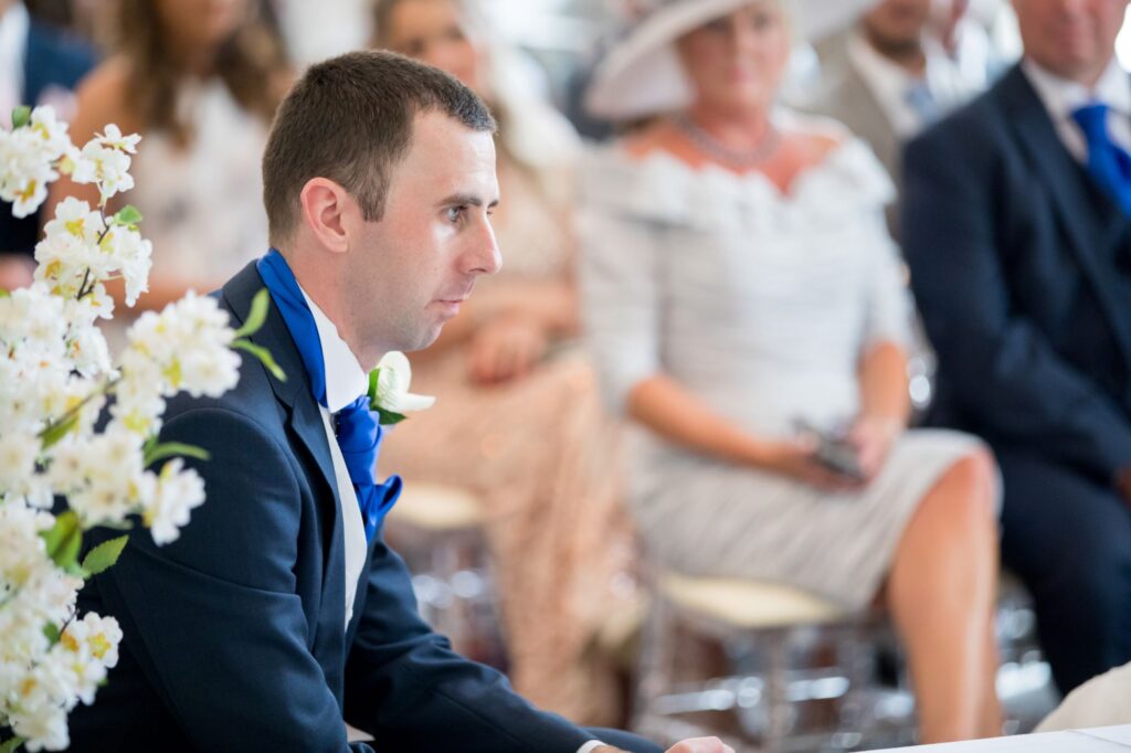 thoughtful groom marriage ceremony de vere beaumont hotel windsor oxfordshire wedding photographer
