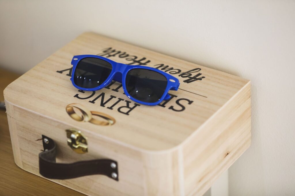 pageboys ring security box sunglasses caswell house venue oxford wedding photographer