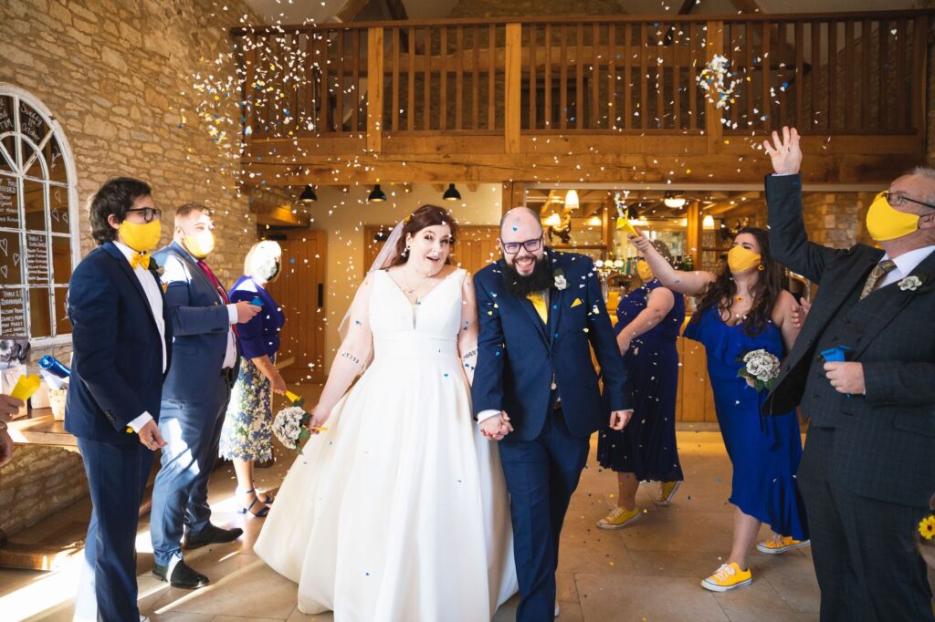 bride groom confetti parade caswell house venue oxford wedding photographer