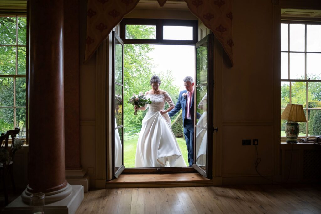 39 bride steps into marriage ceremony room pauntley court gloucester oxford wedding photography