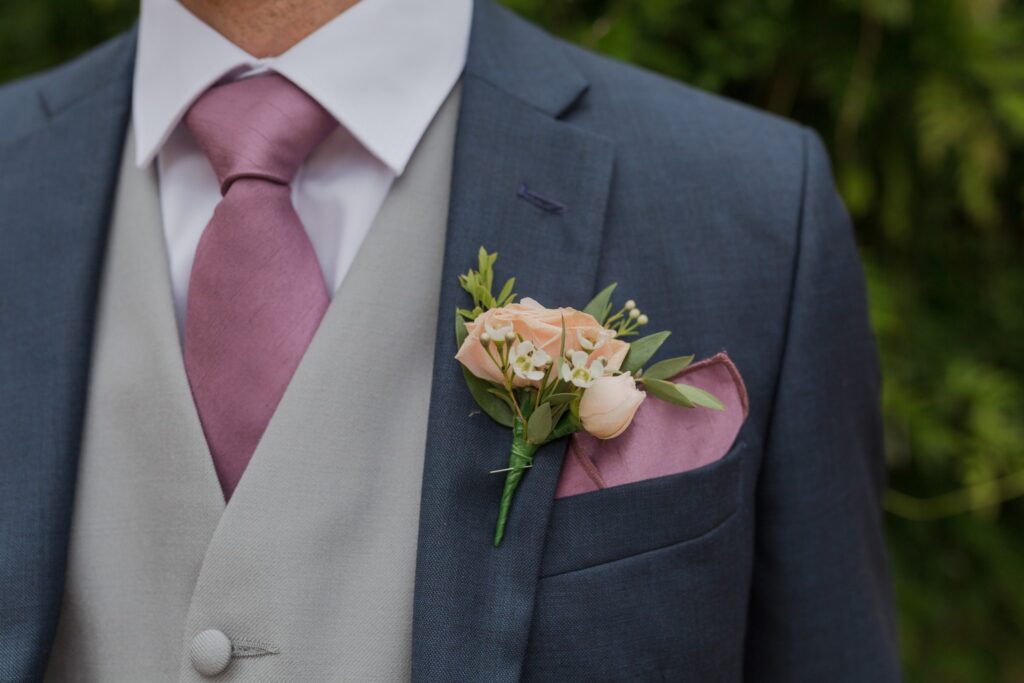 grooms lapel corsage holdenby northamptonshire oxfordshire wedding photographer