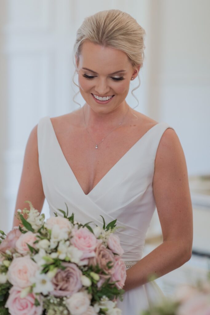 bride carries bouquet holdenby northamptonshire oxford wedding photographers
