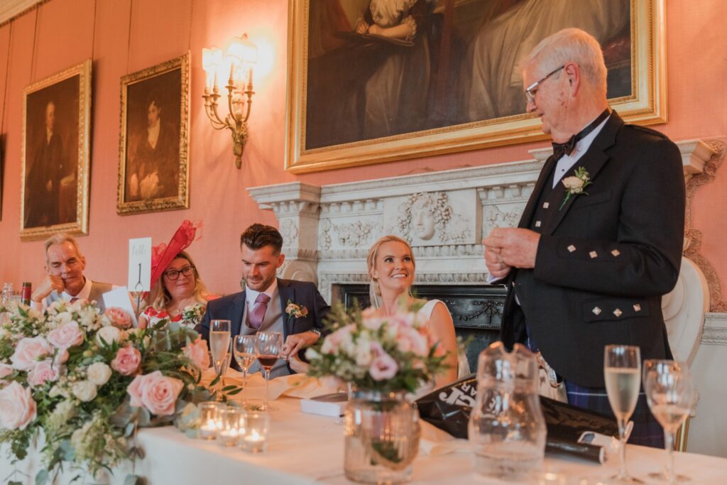 top table guests enjoy wedding breakfast speech holdenby northamptonshire oxfordshire wedding photographer