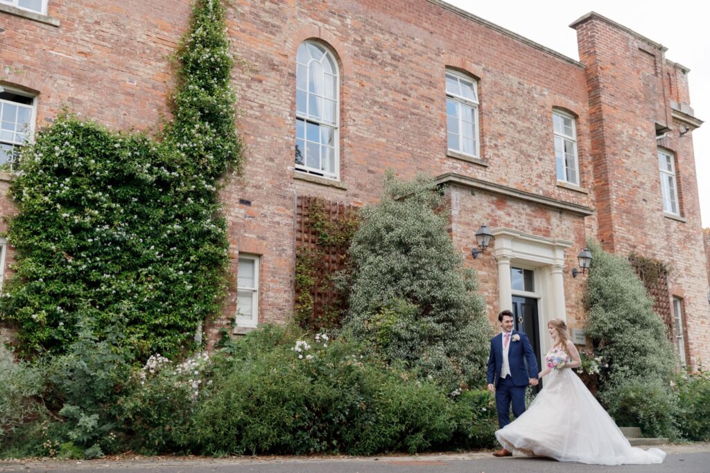 106 bride groom stroll stanbrook abbey hotel grounds worcestershire oxfordshire wedding photography