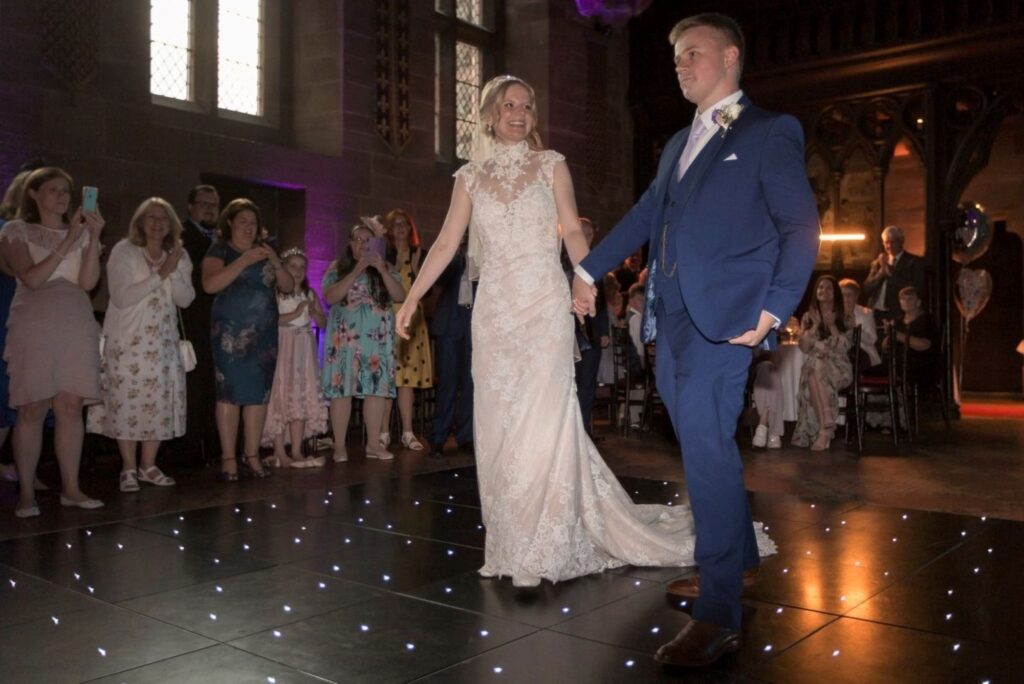 114 bride groom hold hands tarporley castle dancefloor cheshire oxford wedding photographer