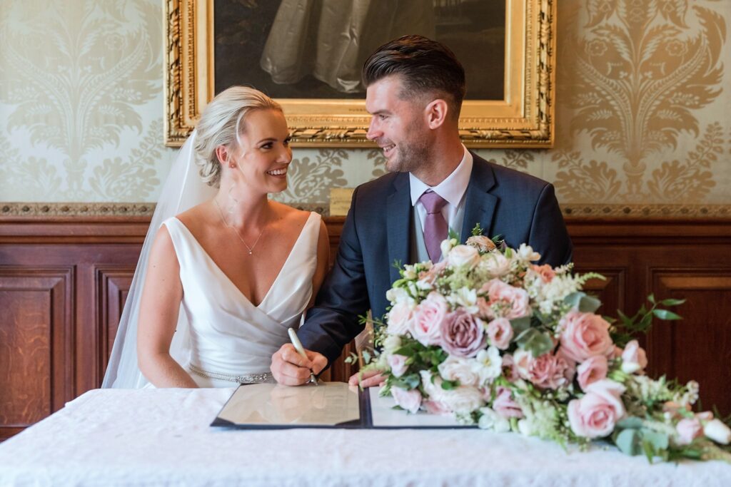 marriage register signing holdenby northamptonshire oxford wedding photographer