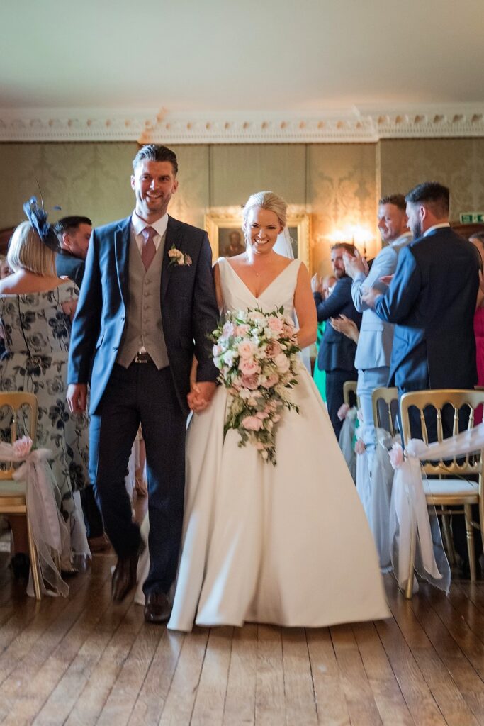 bride grooms aisle walk holdenby northamptonshire oxford wedding photography