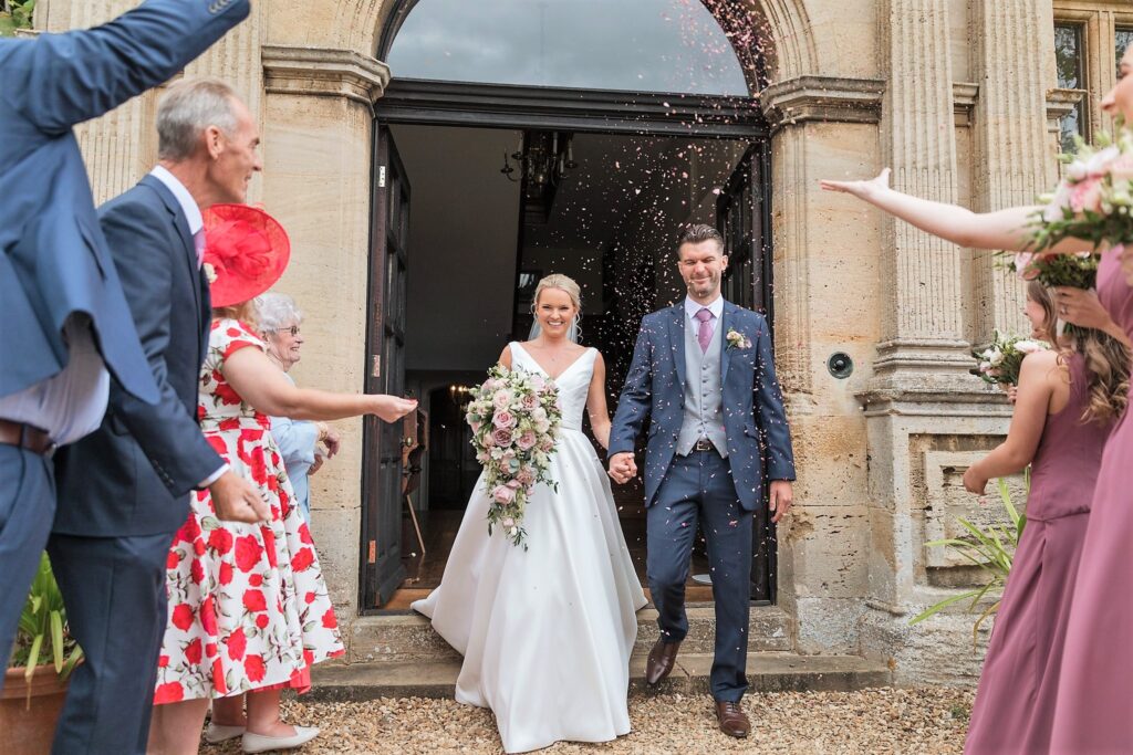 bride grooms confetti shower holdenby house oxford wedding photographer
