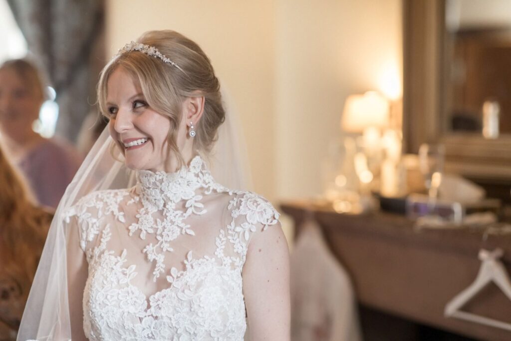17 brides beaming smile bridal prep peckforton castle cheshire oxford wedding photographer