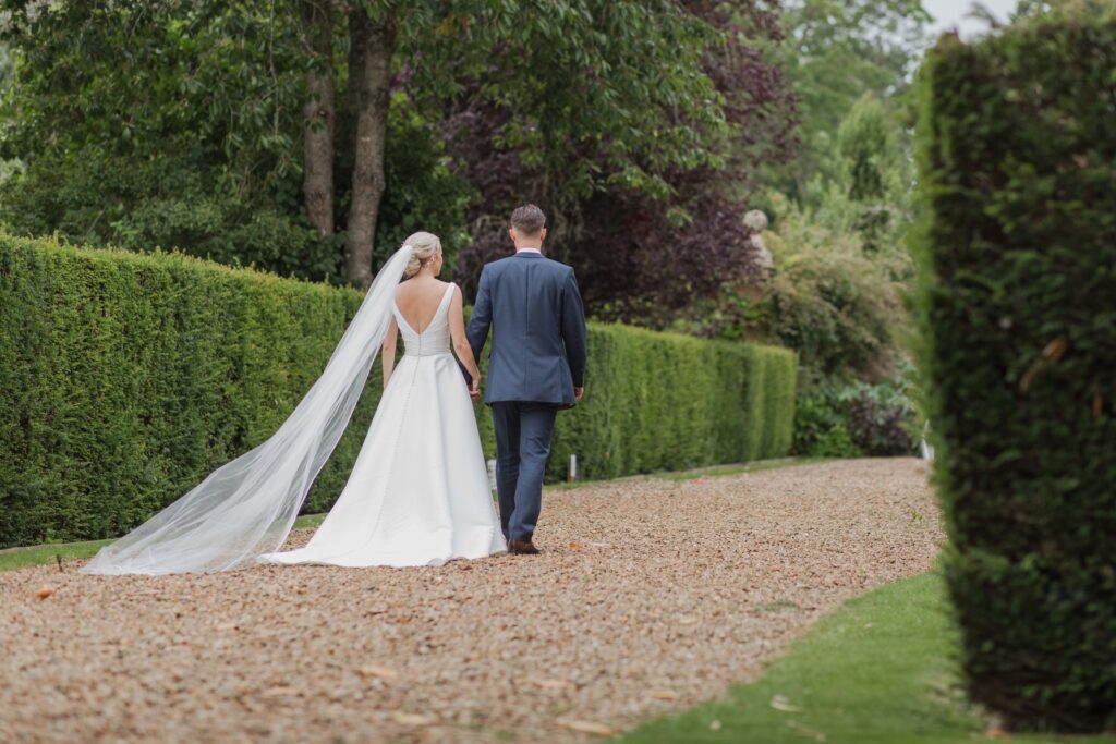 bride groom stroll holdenby house gardens northampton oxfordshire wedding photographer