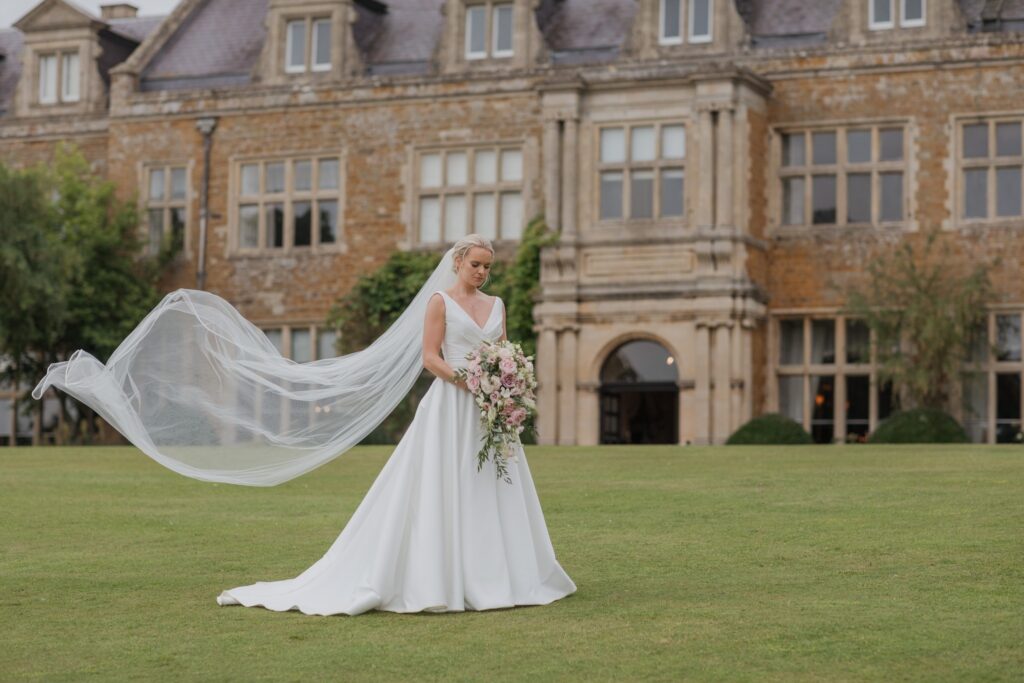 brides flowing veil holdenby house gardens northampton oxfordshire wedding photography