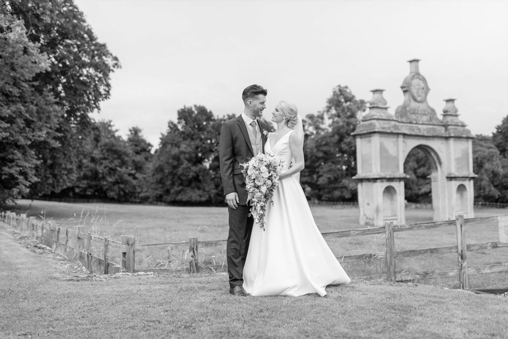 bride grooms romantic moment holdenby house grounds northampton oxford wedding photographer
