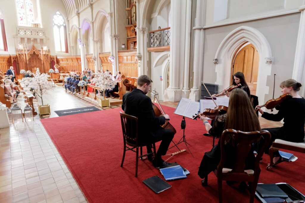 56 string quartet play during register signing callow end marriage ceremony worcester oxfordshire wedding photographers