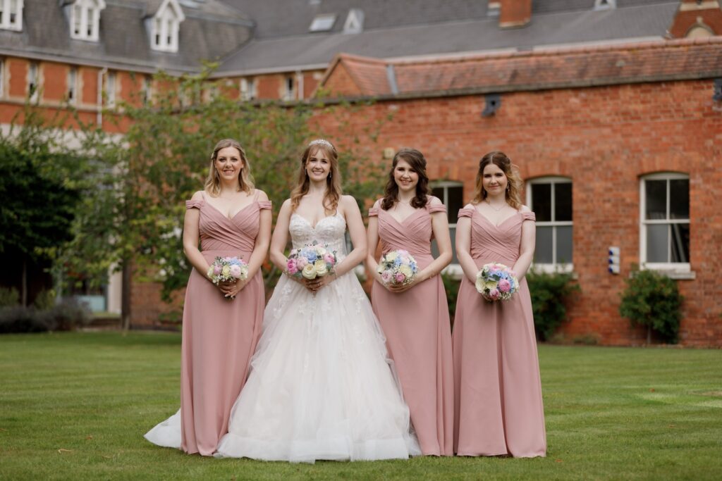 71 bride bridesmaids hold bouquets callow end worcester oxford wedding photographers
