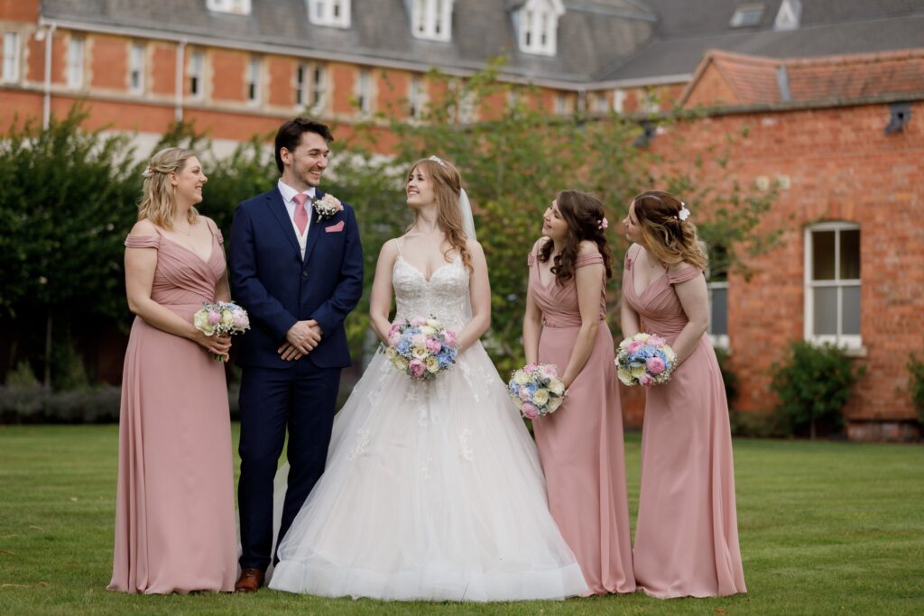 74 smiling groom bride bridesmaids group portrait callow end worcester oxford wedding photography