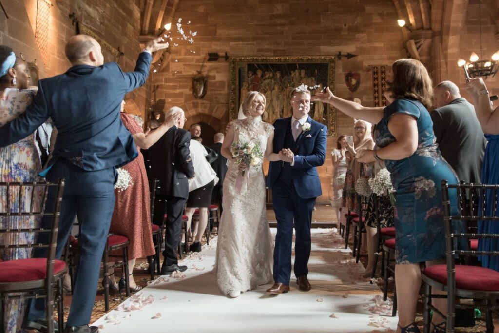 83 guests throw rose petals marriage ceremony tarporley cheshire oxford wedding photography