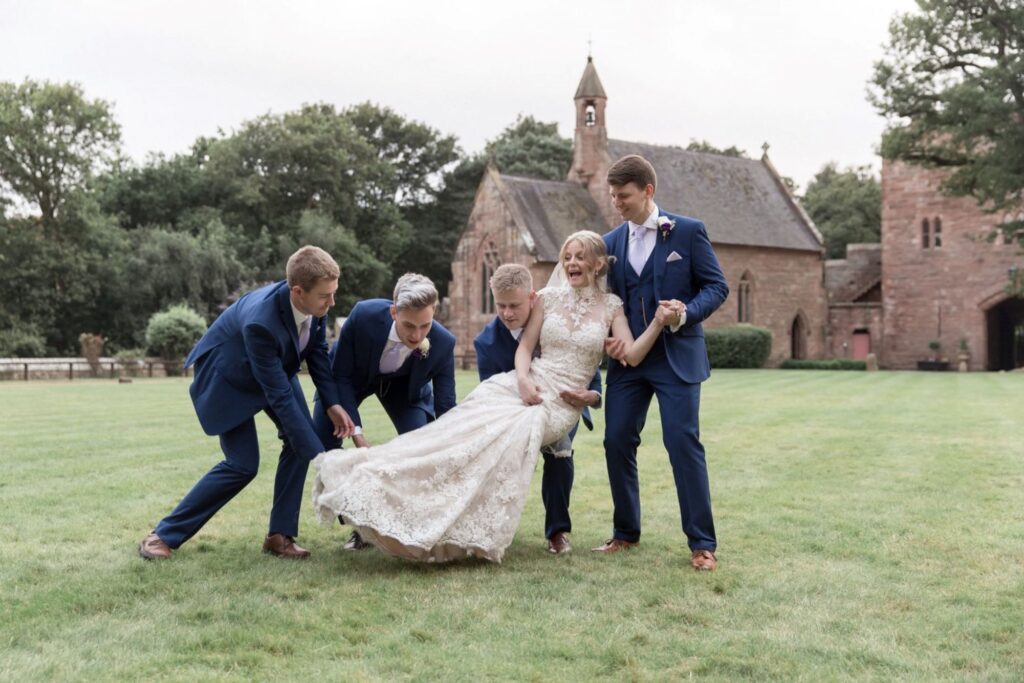 88 groom groomsmen lift bride tarporley cheshire oxford wedding photographers