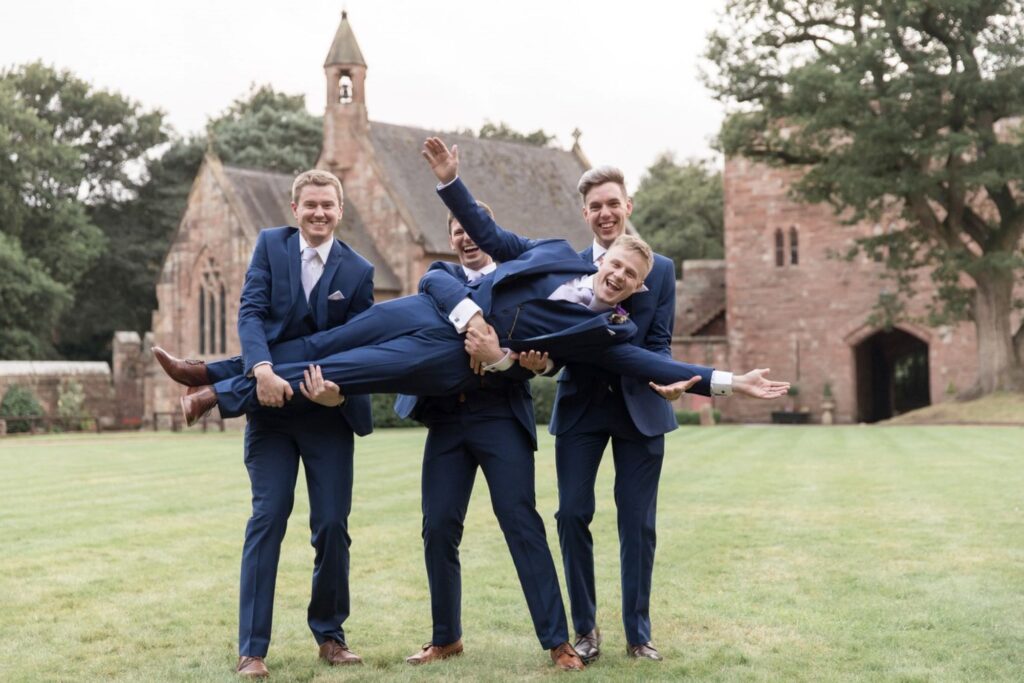 88 groomsmen lift groom tarporley cheshire oxford wedding photographer