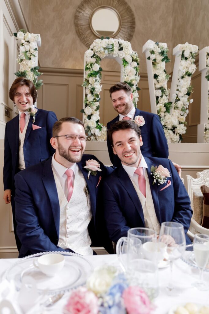 89 laughing groom groomsmen callow end wedding breakfast worcester oxfordshire wedding photography