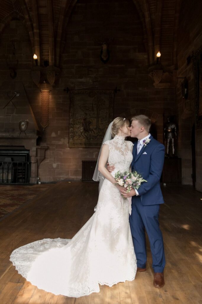 93 bride groom kiss holding bouquet tarporley cheshire oxford wedding photography