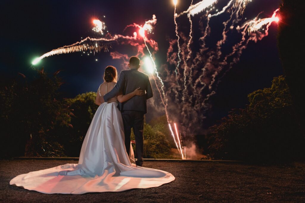 136 bride groom enjoy fireworks display de vere hotel wotton under edge oxfordshire wedding photography