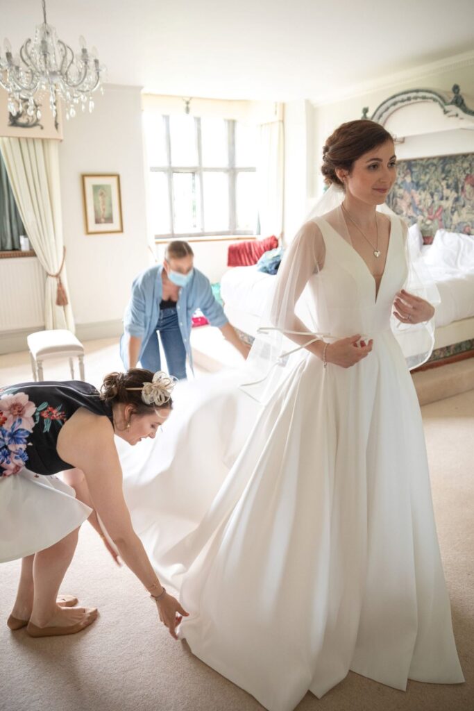 31 brides gown adjusted bridal prep smallfield place surrey oxfordshire wedding photographers