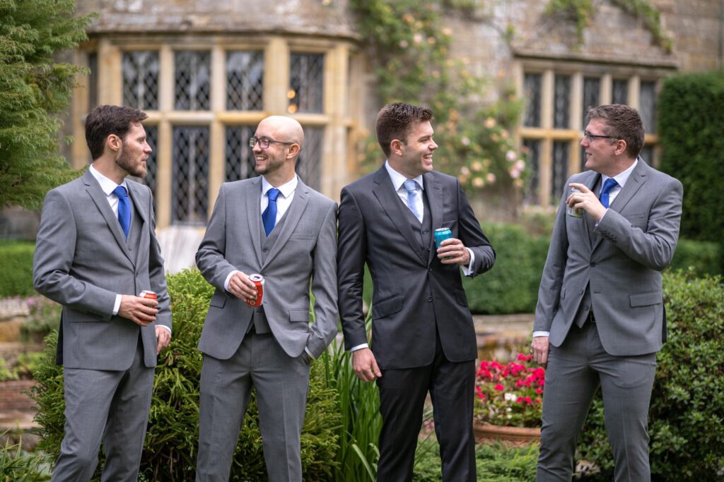 32 grooms party enjoy drinks smallfield place venue surrey oxfordshire wedding photography