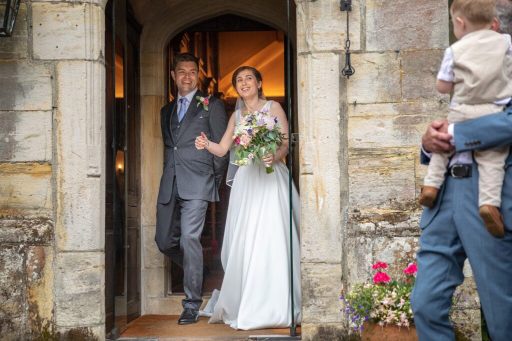 53 bride groom leave ceremony room cogmans lane surrey oxfordshire wedding photographer