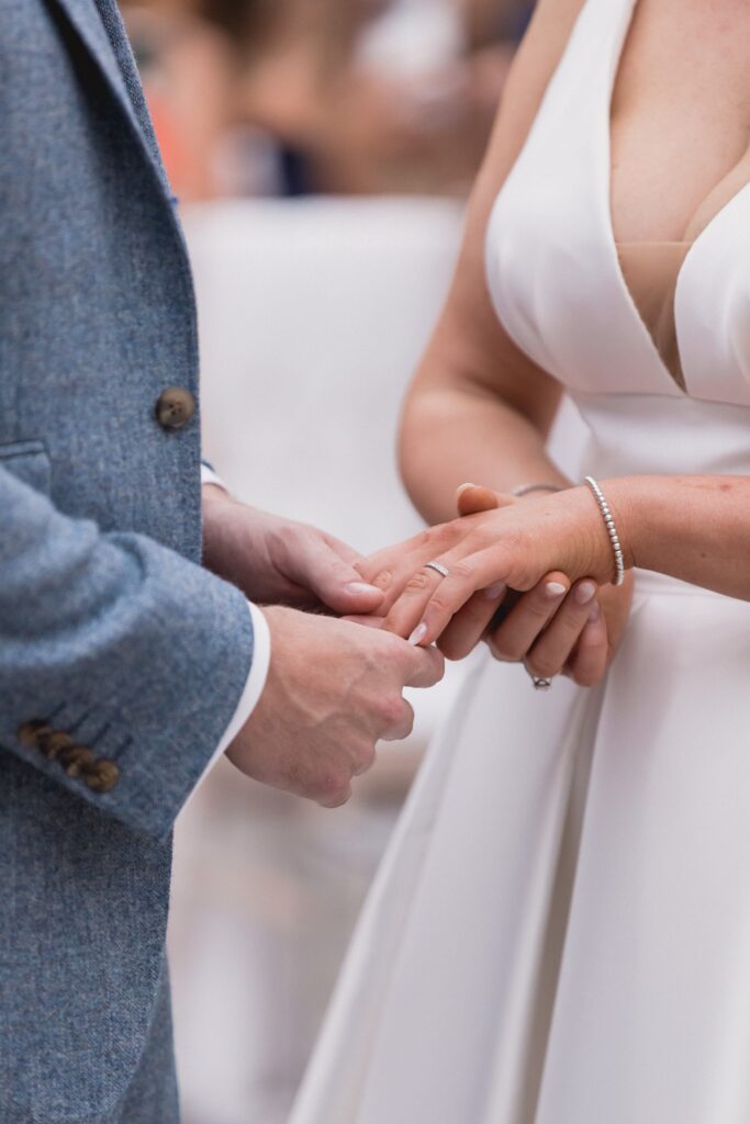 59 bride groom exchange rings de vere hotel ceremony wotton under edge oxfordshire wedding photographer