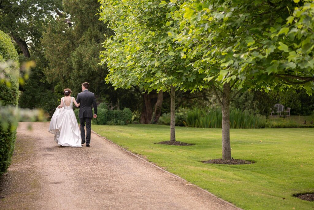 65 bride links grooms arm cogman lane surrey gardens oxfordshire wedding photographer