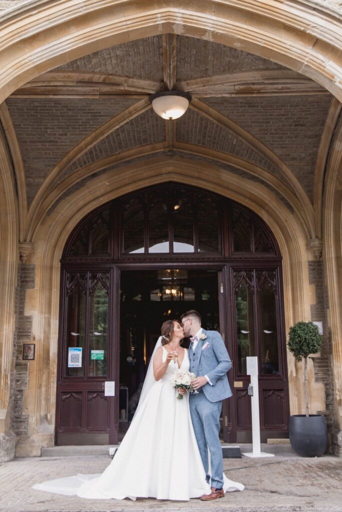 69 bride groom kiss de vere hotel archway wotton under edge oxfordshire wedding photography