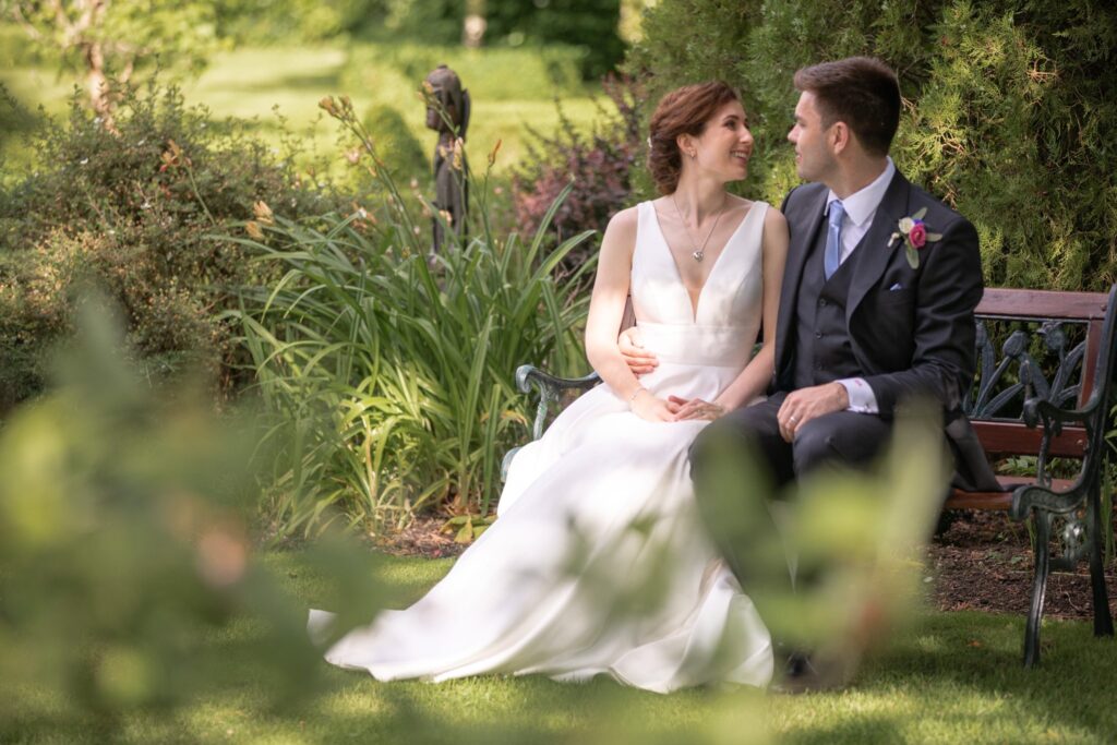 77 bride grooms garden bench romantic moment cogmans lane surrey oxfordshire wedding photographer