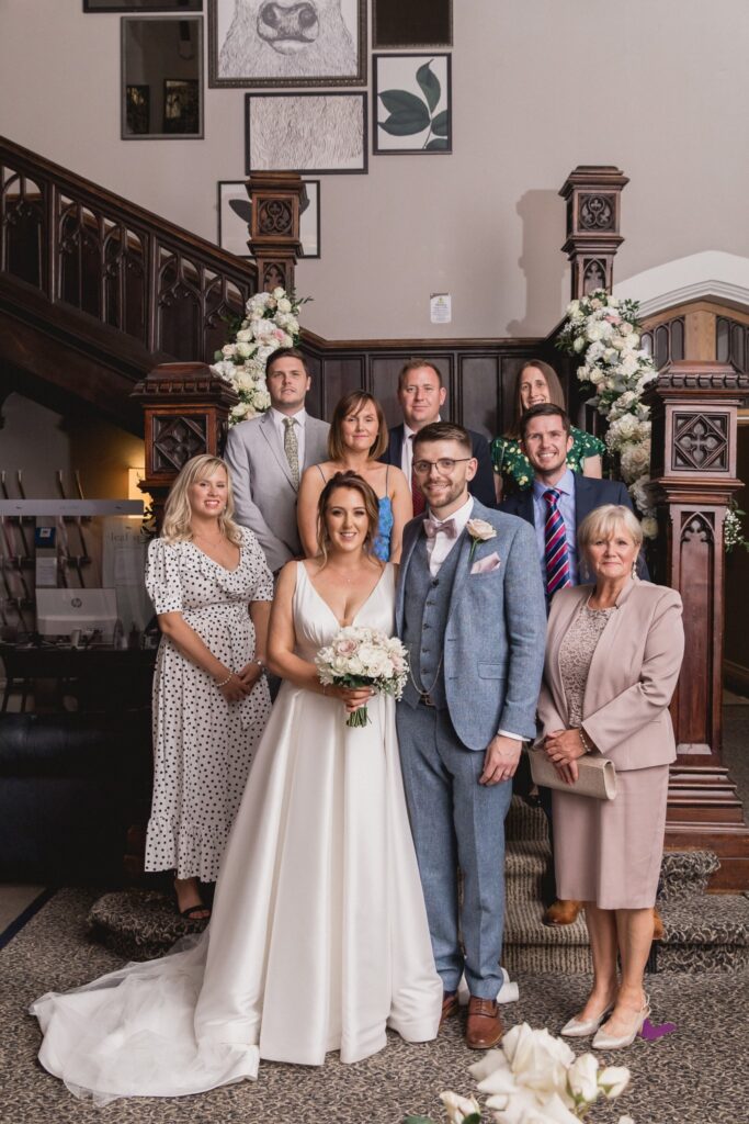 80 bridal party tradional staircase portrait de vere hotel wotton under edge oxfordshire wedding photography