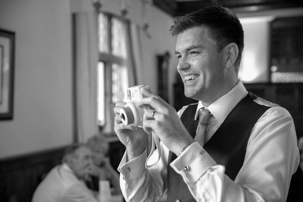 87 smiling groom photographs wedding breakfast guest cogmans lane surrey oxfordshire wedding photographer