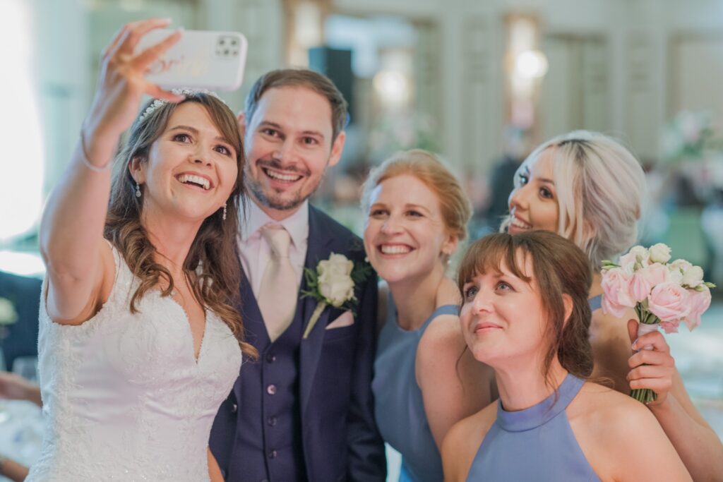 100 bridal party take selfie kimpton fitzroy london hotel reception oxford wedding photographer